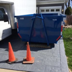 15 yard dumpster rental in client's driveway